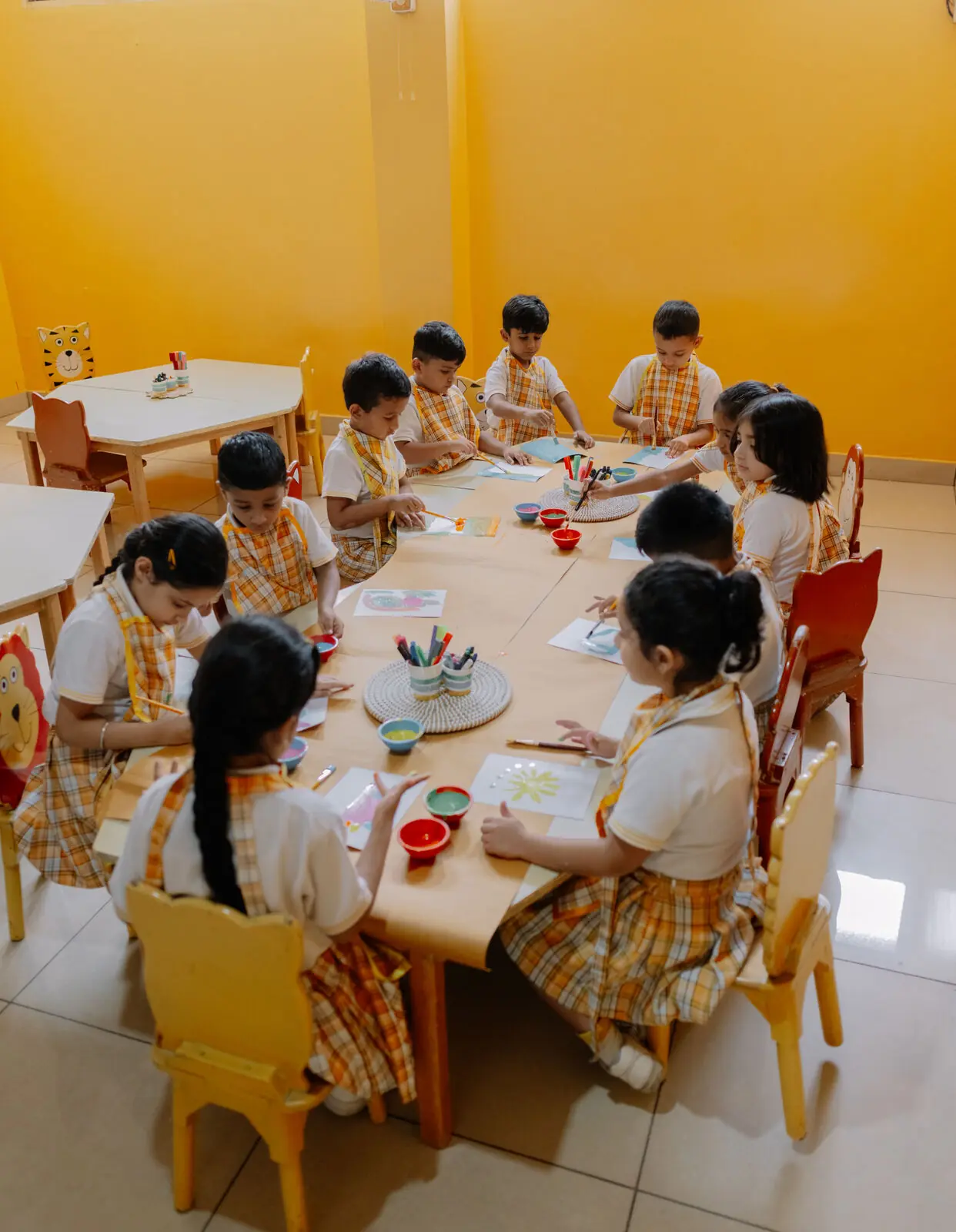 Children at the Craft Club table